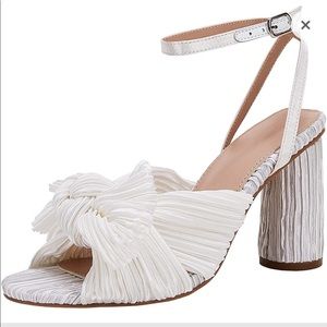 loeffler randall look alike white heels.  Never been worn.